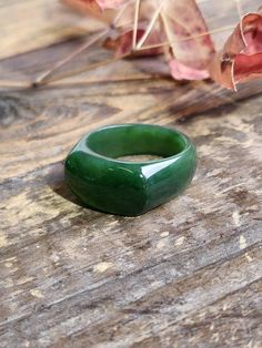 Solid Jade Band Ring hand carved out of solid nephrite Jade from our mines in British Columbia, Canada. Available in sizes 5-12. Thickness varies from approximately 7mm to 11.5mm in the front. Please let me know if you need a size in between and we will try our best to find you the perfect fit. All our jade is 100% natural nephrite jade Carved Green Jade Rings, Green Carved Jade Rings, Makeup Booth, Jade Rings For Women, Jade Accessories, Dope Jewelry Accessories, Ring Hand, Nephrite Jade, Dope Jewelry