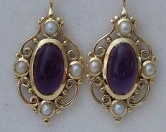 Vintage Amethyst Earrings 9ct 9k 10k Gold E14 pearl by GTJewellers Victorian Hallmarked 14k Gold Earrings, Elegant Yellow Gold Cabochon Earrings, 14k Gold Victorian Filigree Earrings, Victorian 14k Gold Filigree Earrings, Antique Hallmarked 14k Gold Earrings, Ornate 14k Gold Earrings, Elegant Oval Earrings With Intricate Design, Oval Yellow Gold Earrings With Intricate Design, Oval Yellow Gold Filigree Earrings