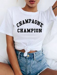 "Champagne Champion T-shirt Cool Casual Funny Hipster Slogan Unisex Tee AVAILABLE SIZES: S,M,L,XL,2XL,3XL COLOR: WHITE, HEATHER GREY, BLACK CONDITION: BRAND NEW T-SHIRT SPECS : 100% high quality pre-shrunk cotton (165 g/m2) jersey). Taped neck and shoulders, twin needle stitching, seamless collar. PRINT: Highest quality print - not cheap \"iron-on\" transfers! MEASUREMENTS : width - armpit to armpit ; length - the body length is measured in a straight line from the highest point of the shoulder Trending T Shirts, Female Shorts, Rave Wear, Trendy Tshirts, Bulgaria, Fashion Inspo Outfits, Chic Style, Fashion Looks, Champagne