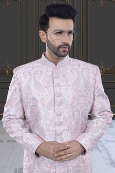 Stay stylish with our Mens Sherwani - M42-S122! This colorful sherwani features intricate stone embroidery that adds a touch of elegance to your outfit. Perfect for special occasions, this sherwani is sure to make a statement and elevate your look. Pink Long Sleeve Sherwani For Wedding, Pink Long Sleeve Bollywood Sherwani, Pink Long Sleeve Wedding Sherwani, Formal Pink Nehru Jacket With Zari Work, Designer Fitted Pink Sherwani, Fitted Pink Bandhgala For Ceremonial Occasions, Formal Pink Kurta With Naqshi Detailing, Long Sleeve Pink Nehru Jacket For Wedding, Pink Long Sleeve Nehru Jacket For Wedding