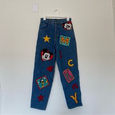 Vintage Mickey Jeans From The 90’s. Super Cute Patches All Over The Pants Bought In Japan 27” Waist 25” Inseam If You Have Any Pet Allergies, Please Note That I Do Own A Cat Mickey Jeans, Pet Allergies, Cute Patches, Owning A Cat, Vintage Mickey, High Jeans, A Cat, Allergies, Jeans Size