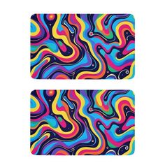 two colorful coasters with different patterns on them