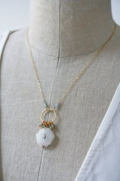 🌟🌟🌟Lovely solar quartz gemstones are great statement pieces. This necklace marries a modern and bohemian aesthetic in one piece.+ Solar Quartz. Natural Zircon. 14K Gold Fill Chain & Spring Ring Clasp. 14K Gold Plate Circle.+ Length: 17 inches with a 1.5 inch drop.+ Necklace takes 1 day to make.+ Your jewelry will come in a jewelry box, tied with a ribbon.➤➤ Have a question about this product, reach out to me here ➙ https://www.etsy.com/conversations/new?with_id=9057464&referring_id=57 Unique Natural Stones Necklace For Wedding, Bohemian Jewelry With Gemstone Accents, Fusion Natural Stone Jewelry For Weddings, Fusion Natural Stones Wedding Jewelry, Fusion Style Natural Stones Wedding Jewelry, Fusion Wedding Jewelry With Natural Stones, Bohemian Gold Jewelry With Gemstone Accents, White Gemstone Fusion Necklace, Fusion Style White Gemstone Necklace