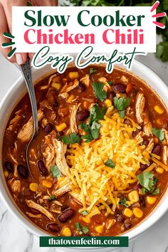 a bowl of slow cooker chicken chili with corn and cheese