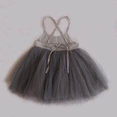 Twirl into summer with this adorable Girl's Sleeveless Tutu Dress! 🩰 Crafted from soft, breathable cotton and featuring delicate embroidery details, this A-line mini dress is perfect for your little princess. The sleeveless design and twirl-worthy tutu skirt will make her the star of any playtime adventure. ✨ Hand wash recommended to keep this precious dress looking its best. 🧺 #babyfashion #tutu #summerdress Specifications: Pattern Type: Solid Style: Casual Decoration: Embroidery Age Range: 6 months - 4 years Gender: Baby Girls Sleeve Style: Regular Material Composition: Cotton Silhouette: A-Line Sleeve Length: Sleeveless Fit: Fits true to size, take your normal size Dresses Length: Above Knee, Mini Washing Instructions: Hand-wash Body Silhouette, Net Skirt, Family Photoshoots, Whimsical Dress, Girls Tutu Dresses, Boho Festival Fashion