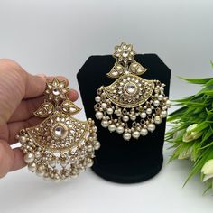 You will absolutely love the shape of this chandbala earrings set with white pearls. This comes with matching maang tikka that will optimise your Indian Wear look. *Handmade in India Silver Danglers With Pearl Drop For Wedding, White Pearl Drop Chandbalis For Wedding, White Chandbali Danglers For Wedding, Traditional White Pearl Chandbalis, White Pearl Temple Jewelry Earrings For Celebration, White Pearl Earrings For Celebrations, Temple Jewelry Style, White Pearl Drop Danglers In Temple Jewelry Style, White Pearl Earrings For Festivals And Gifts, Festive Silver Pearl Earrings For Wedding