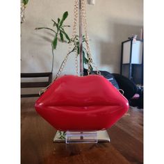 Sassy Lips Bag Will Surely Catch Eyes! Carry This One On Your Next Date Night! The Lips Are Red Colored And Glossy. Features A Gold Chain Strap And Zip Closure. Perfect For Valentine's Day! Measures 9 In.X 6 In.X 2 In. Brand New Condition Red Crossbody Shoulder Bag For Party, Trendy Red Shoulder Bag For Party, Glossy Red Lips, Valentine Coloring, Purse Bag, Crossbody Purse, Red Lips, Chain Strap, Purses Crossbody