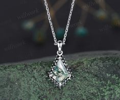 ***This gorgeous green moss agate necklace features a 14k white gold chain and kite-cut green moss agate with a black diamond halo design, unique and special. Perfect for various occasions with a variety of gorgeous dresses***- Metal: Solid gold(9K/14K/18K white/yellow/rose gold),925 sterling silver, platinum available- Main Stone: 7x10mm kite natural moss agate- Accent Stone: black diamonds or black spinels- Chain: 16+2 inches. The chain can be adjustable to 18 Inches.- Can be personalized: Yes Teardrop Pendant With Rose Cut Diamonds For Gifts, White Gold Diamond-shaped Gemstone Jewelry, Rose Cut Diamond-shaped Jewelry As A Gift, Rose Cut Diamond Jewelry Gift, Gift Diamond-shaped Moissanite Jewelry, Gift Moissanite Diamond-shaped Jewelry, Moss Agate Necklace, Black Diamond Pendant, White Gold Chain