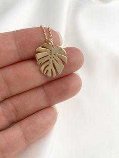 "--NATURE COLLECTION-- This dainty gold monstera leaf necklace is perfect for casual, special occasions or date night. Makes a great gift for Best Friends, Birthdays, Mother's Day, Wedding, Anniversary or any occasion. Choose between 6 beautiful necklace pendants representing the graceful beauty of nature. 1. Tiny Sparkly Bee (12mm x 12mm) 2. Dainty Butterfly (12mm x 10mm) 3. Golden Dandelion (10mm x 16mm) 4. Golden Cactus (9mm x 18mm) 5. Tiny Daisy (11mm x 11mm) 6. Dainty Monstera (16mm x 19mm) Gold Leaf-shaped Nature-inspired Necklace, Nature-inspired Gold Leaf Necklace, Nature-inspired Gold Leaf-shaped Jewelry, Gold Leaf Nature-inspired Jewelry, Adjustable Gold Nature-inspired Necklace, Gold Leaf-shaped Jewelry For Jewelry Making, Gold Bohemian Leaf-shaped Jewelry, Bohemian Gold Leaf-shaped Jewelry, Bohemian Gold Leaf Jewelry