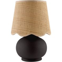 a black table lamp with a beige shade