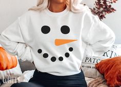 Funny Christmas Snowman Sweatshirt, Cute Family Matching Snowman Face Sweater For Women, Retro Vintage Xmas Holiday Party Crewneck Sweater HOW TO ORDER ➀ Select color ➁ Select the size (Please check size chart) ✦ True to size. Size up 1-2 sizes for an oversized look. ➂ Add to cart ✦ (Optional) "Add message to Seller" on the checkout page. GARMENT FEATURES ✦ Crew neckline ✦ Direct to garment printing - no vinyl, decal, or iron-on technique ✦ Our designs are printed on the garment to last a long time and may not appear as 'glossy' or saturated as iron-on designs are. ✦ Please note that colors may appear different on different digital screens and may not be a true representation of the actual colors. ✦ Additional T-Shirt Colors and Sizes Available Upon Request ✧✧Brands: Bella Canvas Unisex 30 Fun White Winter Tops, Fun White Sweatshirt For Winter, Fun White Tops For Winter, Fun Winter Crew Neck T-shirt, Fun Winter T-shirt With Crew Neck, Fun Crew Neck T-shirt For Winter, Fun Crew Neck Winter Sweatshirt, Fun Winter Crew Neck Sweatshirt, Fun Crew Neck Winter Sweater