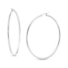 Simple and classic, these earrings are great for any daytime look. Fashioned in cool 14K white gold, these 2.0 x 60.0mm hoop earrings are finished with a bright finish. These earrings secure comfortably with latch backs. Classic White Gold Tarnish Resistant Hoop Earrings, Classic Tarnish Resistant White Gold Hoop Earrings, Classic White Gold Tarnish-resistant Hoop Earrings, Classic Sterling Silver Tarnish Resistant Hoop Earrings, Classic Tarnish Resistant Sterling Silver Hoop Earrings, Classic Sterling Silver Hoop Earrings With Ear Wire, Classic Sterling Silver Hoop Earrings, Hypoallergenic White Gold Hoop Earrings, Minimalist Hoop Earrings With Shiny Finish