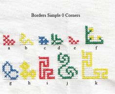 the letters and numbers are made out of different colored plastic beads on a white cloth