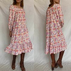 Jane Schaffhausen for Belle France 1970s floral ruffle prairie dress! So pretty and comfy, with pockets! Material tag hard to read, but says cotton & rayon and feels like a little jersey also. Has normal signs of wear for age with no major stains or damage. Approx small/medium or one size fits all, see measurements below: MEASUREMENTS: Bust: approx 19" across Hips: free Length: 43" Sleeve: 22" All sales final, please ask any questions and check measurements before purchasing. Pastoral Prairie Dress With Floral Print, Spring Floral Print Prairie Peasant Dress, Spring Peasant Prairie Dress With Floral Print, Spring Floral Print Peasant Prairie Dress, Spring Peasant Style Prairie Dress With Floral Print, Peasant Prairie Dress With Ruffles For Gatherings, Daywear Prairie Dress With Ruffles, Prairie Dress With Ruffles For Daywear, Cottagecore Prairie Dress With Ditsy Floral Print For Spring