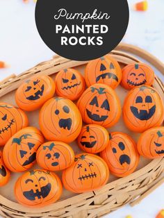 pumpkin painted rocks in a basket with text overlay that reads, pumpkin painted rocks