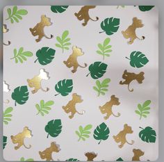 an animal themed wallpaper with gold and green foiled animals, leaves and monkeys