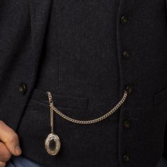 A silver-colored pocket chain with a charm by the pocket is an elegant accessory that adds sophistication to every outfit. With different lengths (from 8 to 18 inches), the chain can be adjusted to individual needs. It will be a perfect choice for a suit, blazer, or pants with a classic background. Its universal character makes it a great gift for everyone - men and women. Regardless of the occasion - birthdays, name days, or holidays - it will definitely please every recipient. T-Bar measure: 3 Classic Background, Pocket Square Folds, Pocket Chain, Pocket Watch Chain, Fancy Jewellery, Silver Colour, Watch Chain, Peaky Blinders, Elegant Accessories