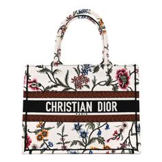 This is an authentic CHRISTIAN DIOR Raffia Embroidered Petites Fleurs Medium Book Tote in White and Multicolor. This tote is crafted of white canvas fabric with multicolored embroidered flowers throughout. The bag features matching rolled canvas handles with a multicolored CHRISTIAN DIOR logo embroidered on the front. The top is open to a matching unlined spacious interior. Dior Floral, Christian Dior Logo, Dior Aesthetic, Dior Book, Christian Dior Paris, Womens Designer Bags, Dior Logo, Christian Dior Fashion, Dior Book Tote