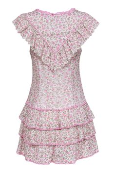 Create an enchanting ensemble with this fresh and feminine LoveShackFancy minidress. The delicate floral print and vintage-inspired ruffle bib add a romantic and dreamy touch, while the pink contrast trim adds a fun and playful twist. A must-have for any special occasion, pair this lovely lace number with strappy pink heels. Size 6 76% Cotton, 24% Nylon Lined Hidden side zipper Mini dress Ruffled collar Round neckline V-shaped yoke w/ buttons Flutter sleeves Drop waist Fitted Bust 33" Waist 30" Shoulder to hem 32.5" Pink Contrast, Spring Knits, Pink Floral Print, Ruffled Collar, Pink Heels, Eyelet Lace, Denim Design, Size 6 Dress, Knit Outfit