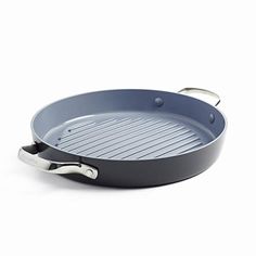 an empty frying pan on a white background