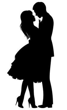 a couple in silhouette kissing each other