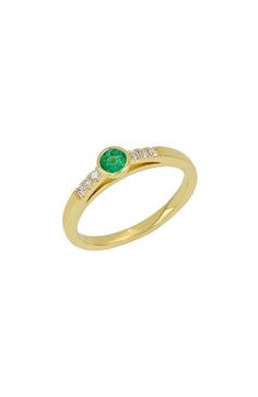 Dainty trios of round-cut diamonds draw the eye to the stunning bezel-set emerald atop this slender band cast in radiant 18-karat gold. 1/8" round setting Total emerald weight: 0.18ct. Total diamond weight: 0.09ct. Color: G Clarity: VS 18k gold/emerald/diamond Made in the USA >Diamond Guide Classic Green Diamond Ring With Bezel Setting, Classic Yellow Gold Emerald Ring With Single Cut Diamonds, Luxury Emerald Ring With Diamond Channel Set, Luxury Emerald Diamond Ring With Channel Set, Timeless Diamond Emerald Ring With Bezel Setting, Formal Round Emerald Ring With Single Cut Diamonds, Luxury Emerald Ring With Tension Setting For Anniversary, Elegant Emerald Ring With Tension Setting For May Birthstone, Classic Emerald Ring With Diamond And Tension Setting