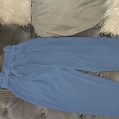 Size 2 Brand New Haigh Waisted Trouser Color Blue Front Zip With Metal Clasps Polyester Material Blue High Waist Bottoms For Date Night, High Waist Blue Bottoms For Date Night, Chic Blue Bottoms For Date Night, Fitted Blue Bottoms With Tie Waist, Elegant Blue Bottoms For Brunch, Elegant Blue Bottoms For Day Out, Blue Tie-waist Bottoms For Day Out, Blue Bottoms With Tie Waist For Day Out, Casual Blue Pants For Night Out