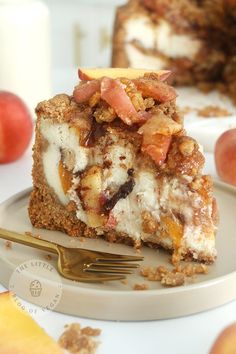 a piece of cake sitting on top of a white plate next to an apple slice