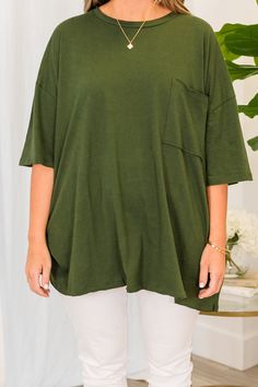 Embrace comfort and style effortlessly with this top! This army green versatile top is perfect for a casual day out on the town, and can be easily paired with skinnies or leggings! The raw hemlines adds a touch of uniqueness to your look! Get ready to feel comfortable and confident in this top! 100% Cotton Versatile Solid Color Tops For Loungewear, Versatile Oversized Solid Color Top, Trendy Green Tops For Everyday Wear, Dark Green Cotton Top For Spring, Dark Green Cotton Tops For Spring, Olive Stretch Tops For Fall, Oversized Solid Color Tops For Day Out, Oversized Olive Top For Fall, Oversized Olive Cotton Top