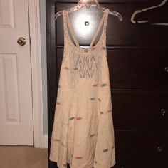 Never Worn Casual Sleeveless Boho Dress For Brunch, Casual Sleeveless Boho Dress For Day Out, Spring Bohemian Unlined Midi Dress, Cotton Sleeveless Mini Dress For Festival, Unlined Bohemian Dresses For Spring, Beige Lined Casual Sundress, Casual Unlined Dress For Day Out, Casual Beige Lined Sundress, Beige Bohemian Cotton Mini Dress