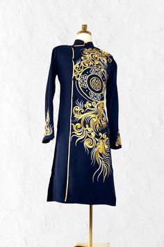 Brand New Black Embroidered Ao Dai Vietnamese Man Long Dress Ao Dai Black Color link: https://aodaiminhphat.etsy.com/listing/1724161146 SizeChestWaist S36in/91cm34in/86cm M38in/97cm36in/91cm L40in/102cm38in/97cm XL42in/107cm40in/102cm 2XL44in/112cm42in/107cm 3XL46in/117cm44in/112cm 4XL48in/122cm46in/117cm 5XL49in/124cm47in/119cm 6XL50in/127cm48in/122cm https://aodaiminhphat.etsy.com Return and Exchange Policy: Exchange for same color and design is accepted if return item is received within 7 days of delivery.  Customer is responsible for shipping charges both ways.   Return for refund is NOT accepted. Clearance 20%-30% discount Ao Dai are NOT accepted for Exchange or Return. Traditional Fitted Blue Ao Dai, Traditional Blue Fitted Ao Dai, Traditional Embroidered Blue Ao Dai, Men Ao Dai, Ao Dai Vietnamese, Vietnamese Men, Mens Wedding Suits, Wedding Suits Men, Ao Dai