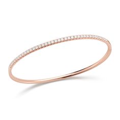 Wrap your wrist in perfection with this delicate diamond bangle bracelet. Effortlessly gorgeous on its own or stacked with other bracelets. -14K gold weighing 10.14 grams -37 round pave-set diamonds totaling 0.95 carats Available in yellow, white, & rose gold. Please allow 4-6 weeks for delivery if item is not in stock. Item no. BR10634 Baguette Diamond Wedding Band, Diamond Engagement Rings Cushion, Cushion Halo Engagement Ring, Classic Bangles, Diamond Chain Necklace, Marquise Diamond Engagement Ring, Diamond Bangle Bracelet, Stackable Diamond Rings, Diamond Bar Necklace