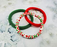 Set of 3 Pcs Christmas Colors Nepal Bracelets. Exactly as shown in the picture. All Bracelets are SHIPPED FROM USA. You are buying direct from the makers. This listing is for 3 Bracelets as shown in the picture. Made with Czech Glass Beads and Cotton Thread. Multicolor Festive Bracelets For Christmas, Festive Red Hand-set Bracelets, Adjustable Christmas Festive Bracelet, Multicolor Round Beads Christmas Bracelets, Crochet Xmas Gifts, Multicolor Christmas Bracelet Jewelry, Nepal Bracelets, Holiday Bracelets, Crochet Xmas