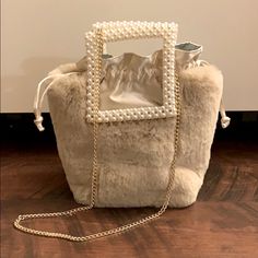 Zara Fur Basket Bag With Pearl Handles,Satin And Gold Chain Strap,New,Never Worn. Never Had Time For It,Selling With The Same Price That I Bought It. 60$ + Taxes. Size 8”H X 8”W X 3.5” D Cream Shoulder Bag For Summer Evenings, Cream Square Shoulder Bag For Evening, Cream Square Evening Bag, Square Cream Evening Bag, Beige Bucket Shoulder Bag For Party, Cream Tote Shoulder Bag For Party, Chic Tote Shoulder Bag For Events, Elegant Evening Bag With Chain Strap And Bucket Shape, Chic Zara Shoulder Bag For Party