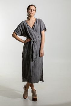 Designed for all body types and made for everyday wear, it's oversized relaxed fit , effortless and comfortable.  Made to share in life's greatest joys and memories, which is why they're made from the highest quality 100% pure organic French linen  Feminine and bold piece is ideal for day to night. Pair it with a layer and boots for those cooler days.  * Includes one dress * Made from 100% European flax * Pre washed for maximum softness Material 100% French flax linen Fabric Weight 160 GSM  Feat Casual Cotton V-neck Wrap Dress, Casual Wrap Dress For The Beach, Casual Wrap Dress With Tie Waist, Casual Maxi Dress With Surplice Neckline For Daywear, Casual V-neck Cotton Wrap Dress, Relaxed Fit V-neck Linen Dress With Pockets, Casual Wrap Midi Dress With Tie Waist, Relaxed Fit V-neck Dress With Tie Waist, Cotton Dress With Tie Waist And Relaxed Fit