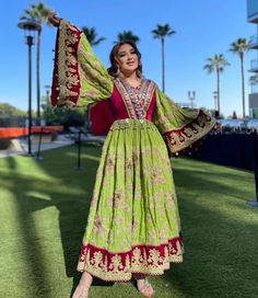 This is the traditional dress of Afghans, which is worn in sweet gatherings, weddings, and gatherings. It has one color, the size is your choice. The fabric is a new design, which is combined with chirma and velvet, and it is embroidered and stitched on the inside. And in the middle of it, embroidery and coins are sewn Afghan Dress 2022, Afghan Dresses Modern 2022, Afghan Dresses 2022, Afghan Dresses Traditional 2022, Afghan Velvet Dress, Afghanistan Robe, Green Gown For Traditional Ceremonies And Festivals, Folk Style Wedding Dress For Eid, Ceremonial Dresses With Embroidered Border And Traditional Drape