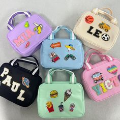 four small lunch bags with different designs on the front and back, one for boys and one for girls