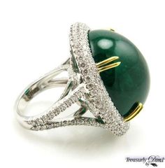 Elegant Emerald Ring With Oval Cabochon, Elegant Cabochon Emerald Ring, Elegant Green Emerald Cabochon Ring, Elegant Emerald Cabochon Ring, Elegant Green Cabochon Emerald Ring, Elegant Emerald Ring With Cabochon Cut, Luxury Emerald Cabochon Ring With Diamonds, Luxury Oval Cabochon Emerald Ring, Elegant White Gold Cabochon Emerald Ring