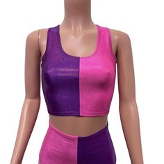 The perfect rave outfit that includes our high-waisted hot pants and crop tank in purple and pink sparkle spandex. Fitted Purple Tank Top For Night Out, Fitted Purple Crop Top For Festival, Pink Fitted Top For Cheerleading, Pink Fitted Rave Crop Top, Fitted Pink Rave Crop Top, Purple Crop Top For Club, Fitted Pink Crop Top For Rave, Purple Stretch Club Top, Purple Stretch Tops For Club