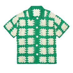 a green and white knitted shirt with snowflakes on it