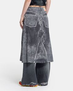 Diesel O-Hanna Denim Skirt in Black The O-Hanna Skirt features a realistic trompe l’oeil print across a soft, stretch satin midi silhouette, referencing the pinstriped devoré-denim runway look of the previous season. The skit has an A-line shape and a subtle side zip closure. - 95% Viscose, 5% Elastane. - Made in China. - Dry clean. - A13982 0LIBA. A13982 0LIBA 9XXA Tara is 6'0 (183cm) and is wearing a size M. Diesel Skirt, Denim Runway, Diesel Denim, Eckhaus Latta, Stretch Satin, Inspiration Board, Helmut Lang, Issey Miyake, British Indian