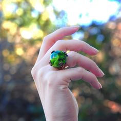 https://www.etsy.com/ca/shop/GZZStore The dainty ring is handmade, bronze, Murano glass, and anti-allergic. Glass is unbreakable and durable. The green ring is suitable for you between 12-22. RING SIZE ; GLASS DIAMETER (2.5cm), ,HEIGHT (3.5cm), WIDTH (2.5cm) You can stretch it to your wrist. Our products are handmade. Small differences in products may also occur. Manufactured with lampworking technique. Feel happy while using it. Handmade Glass ring, gift for her, gift, for women,  handmade jewe Halloween Ring, Oversized Fashion, Green Ring, Green Rings, Glass Ring, Bronze Ring, Oversize Fashion, Feel Happy, Large Ring