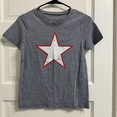 Blue T Shirt With Red And White Star Graphic Grayson Threads, Size Xs Nwot. Never Worn! Casual Red Tops With Star Print, Casual Red Top With Star Print, Casual Red Star Print Tops, Casual Short Sleeve Shirt With Star Print, Casual Star Print Short Sleeve Shirt, Red Short Sleeve Top With Star Print, Red Star Print Crew Neck Tops, Casual Crew Neck T-shirt With Star Print, Cotton Crew Neck Shirt With Star Print