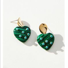 Rendered In The Most Gorgeous Green And Blue, These Heart-Shaped Earrings Lend A Whimsical Touch To Daily Outfitting. 14k Gold-Plated Brass; Malachite, Cubic Zirconia Questions? Leave A Comment Below! Green Heart Shaped Earrings For Parties, Green Heart-shaped Jewelry For Party, Green Heart Charm Earrings For Valentine's Day, Green Heart-shaped Earrings For Valentine's Day, Green Heart-shaped Party Jewelry, Green Heart Earrings For Valentine's Day, Green Heart Earrings For Valentine's Day Party, Green Earrings For Valentine's Day Party, Trendy Green Heart Earrings For Gift