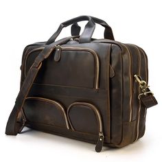 This Vintage Distressed Leather Laptop Briefcase by ULB is crafted from Full Grain Leather in a rich, dark brown color with a rugged, worn finish for a timeless look. It features multiple compartments, including two large front pockets and two smaller zippered ones, with brass zippers that contrast nicely against the leather. Sturdy leather handles ensure durability, making this briefcase a stylish and practical choice for carrying essentials. Leather Messenger Bag Men, Leather Briefcase Men, Luggage Bags Travel, Laptop Briefcase, Women Leather Backpack, Leather Laptop, Luggage Bag, Leather Briefcase, Leather Messenger Bag