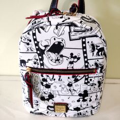 All Aboard For A Nostalgic Ride Back To Mickey's Movie Debut With This Backpack By Dooney & Bourke. The Allover Print On This Stylish And Compact Coated Cotton Bag Features Film Frames, And Memorable Scenes From Walt Disney's 1928 Black And White Cartoon Steamboat Willie. Features: Allover Print Featuring Scenes From Steamboat Willie* Screen Art On Coated Cotton* Stitched Leather Finishings With Red Edging Zip Top Closure With Double Zip Pull Exterior Zip Pocket On Front Exterior Zip Pocket On B Mickey Mouse Steamboat Willie, Screen Art, White Cartoon, Disney Dooney, Walt Disney Mickey Mouse, Black And White Cartoon, Steamboat Willie, Flap Backpack, Vintage Backpacks