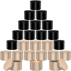 a pyramid made out of black and gold containers with candles in them on a white background