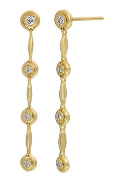 Round diamonds shine in textured settings between bars of 18-karat gold on these handcrafted, linear drop earrings. 1 1/4" drop Post back Total diamond weight: 0.12ct. Color: G Clarity: VS 18k gold/diamond Imported >Diamond Guide Gold Diamond Linear Earrings For Anniversary, Luxury Linear Drop Earrings With Single Cut Diamonds, Luxury Gold Linear Earrings With Prong Setting, Gold Linear Earrings With Prong Setting For Formal Events, Gold Linear Earrings With Prong Setting For Formal Occasions, Gold Linear Earrings With Diamond Accents, Elegant Gold Long Drop Diamond Earrings, Gold Diamond Dangle Linear Earrings, Modern Gold Earrings With Bezel Setting