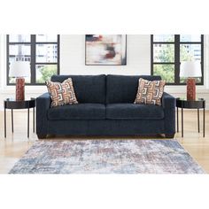 a living room scene with focus on the couch