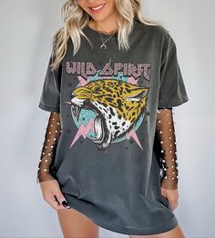 Wear this Comfort Colors Wild Spirit Rock And Roll Vintage Shirt to your next concert or night out. This vintage band tee is slightly distressed and oversized, providing you with trendy style and comfort for that y2k aesthetic. * Ultra soft * Distressed design * Pre-shrunk * Universal fit * True to size * DTG Printing * Brand - Comfort Colors Refunds/Exchanges: * No Cancellations * No returns/exchanges * All sales are final Sizing: Our graphic tees and sweatshirts are a true to size standard uni Vintage Rock Shirt, Graphic Tshirt Outfit, Cute Concert Outfits, Country Concert Shirts, Concert Attire, Vintage Band T Shirts, Metal Shirts, Country Music Shirts, Leopard Shirt